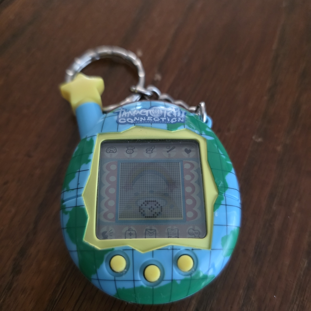 Tamagotchi Connection Virtual Pet - Blue and Yellow